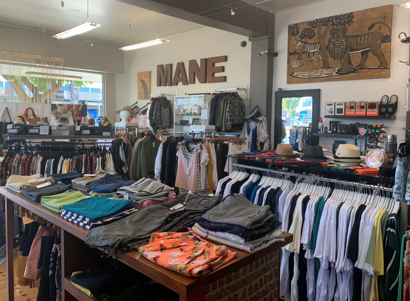 Inside the Mane store, racks of curated menswear
